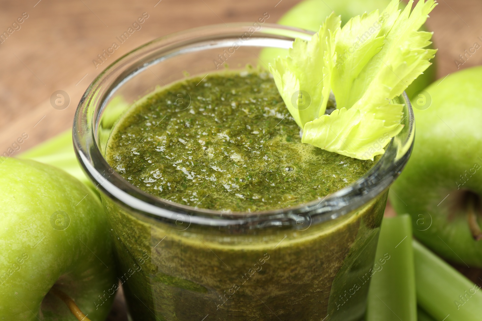 Superfood. Tasty smoothie in glass and ingredients on table, closeup Photo of Superfood. Tasty smoothie in glass and ingredients on table, closeup