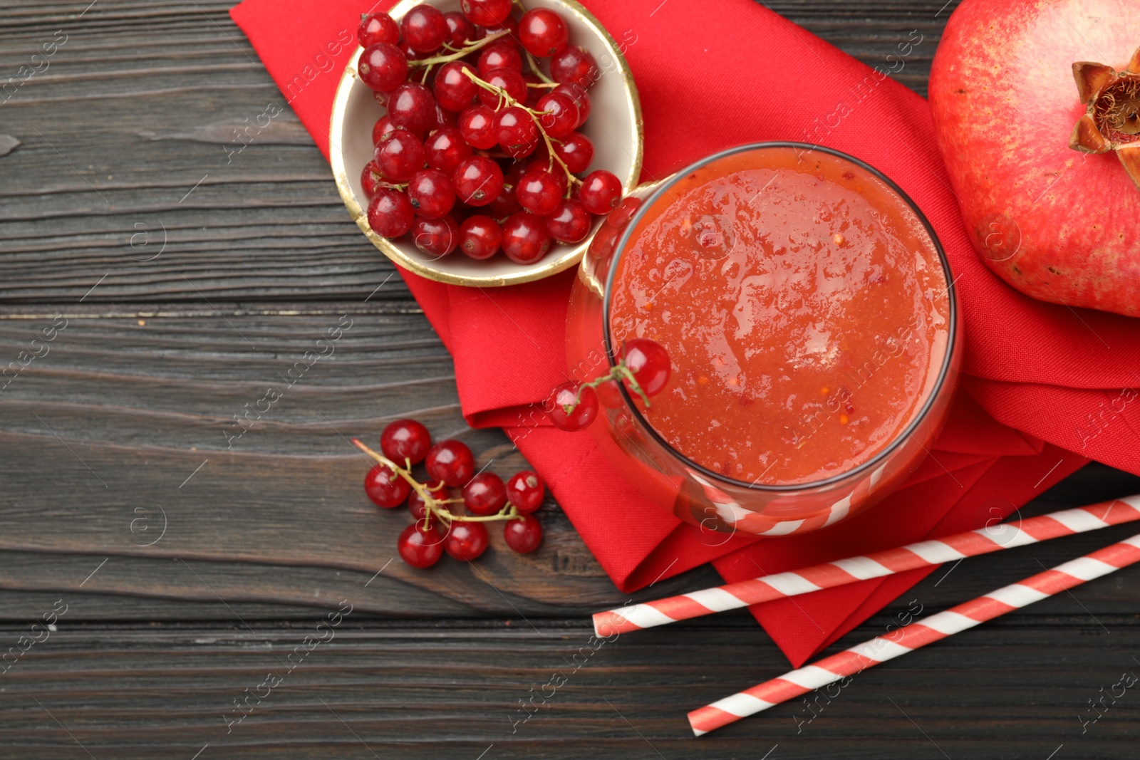 Superfood. Tasty smoothie in glass and ingredients on wooden table, flat lay. Space for text Photo of Superfood. Tasty smoothie in glass and ingredients on wooden table, flat lay. Space for text