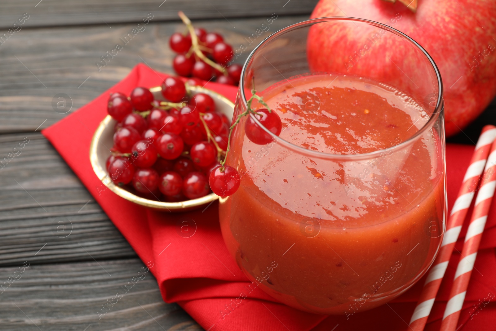Superfood. Tasty smoothie in glass and ingredients on wooden table, closeup Photo of Superfood. Tasty smoothie in glass and ingredients on wooden table, closeup