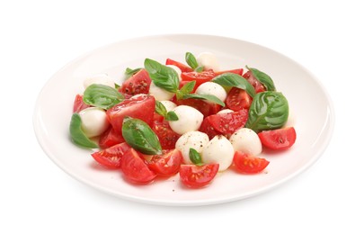 Photo of Tasty salad Caprese with mozzarella, tomatoes, basil and spices isolated on white