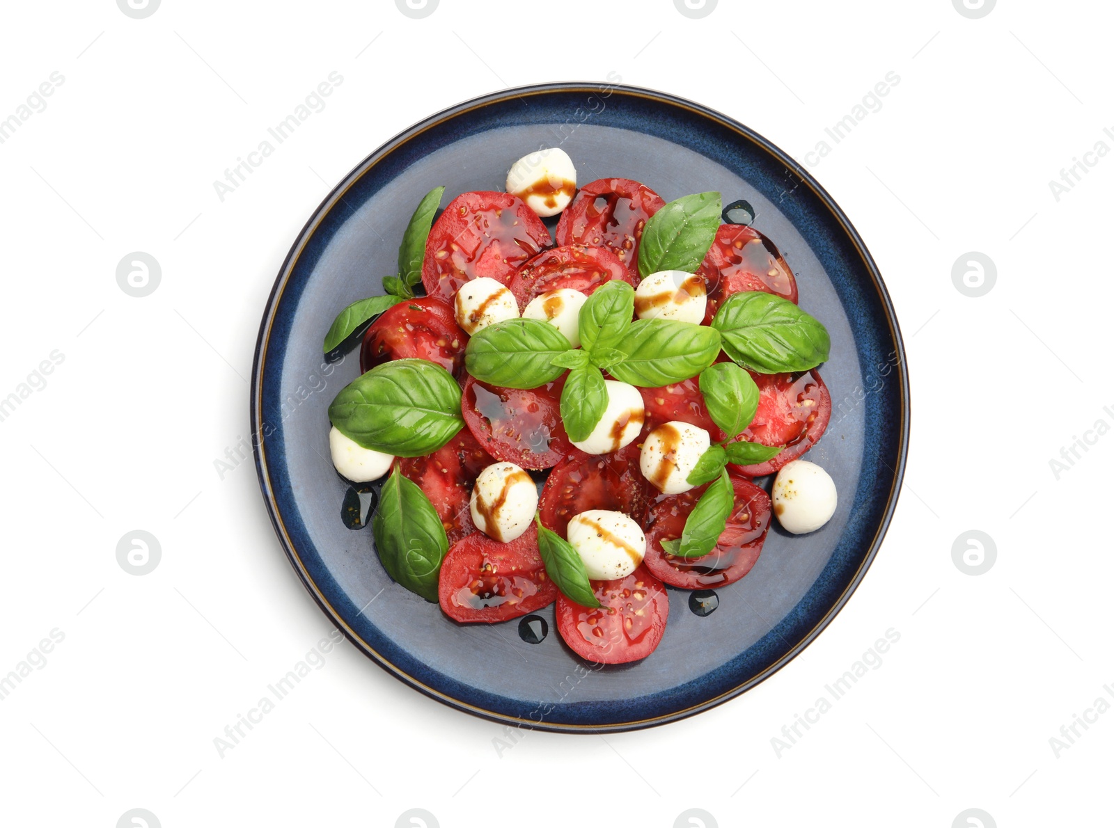 Tasty salad Caprese with mozzarella, tomatoes, basil and balsamic vinegar isolated on white, top view Photo of Tasty salad Caprese with mozzarella, tomatoes, basil and balsamic vinegar isolated on white, top view