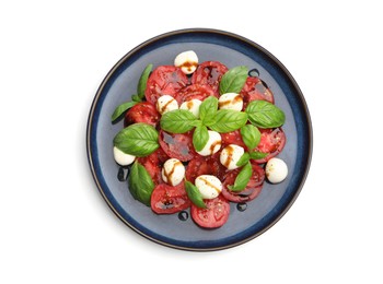 Photo of Tasty salad Caprese with mozzarella, tomatoes, basil and balsamic vinegar isolated on white, top view