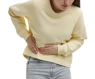 Photo of Woman suffering from flank pain on white background, closeup