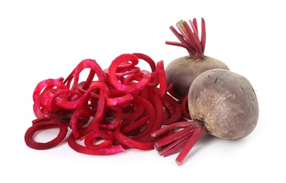 Photo of Raw beetroot noodles and fresh vegetables isolated on white. Vegetarian dish