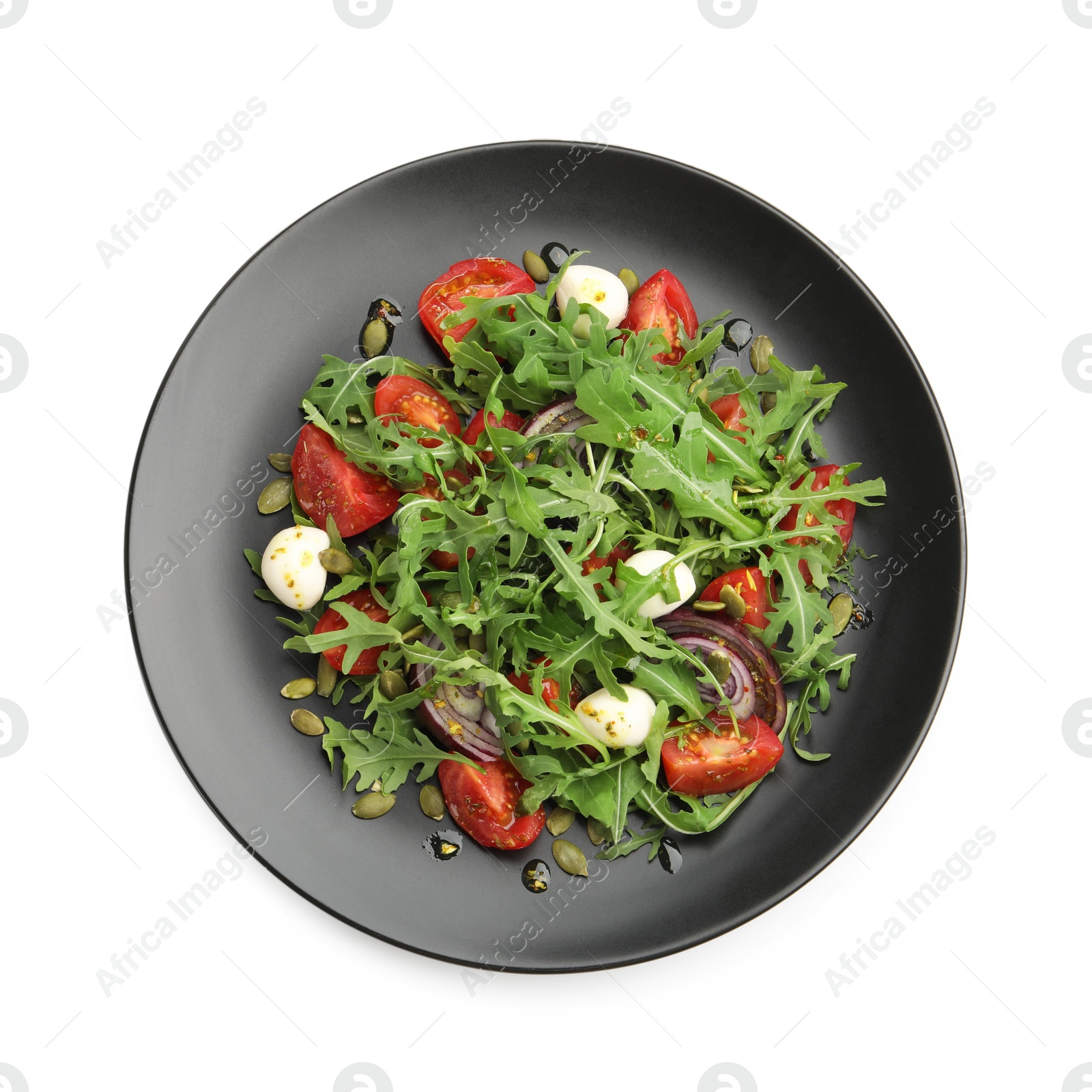 Tasty salad with arugula, mozzarella and vegetables isolated on white, top view Photo of Tasty salad with arugula, mozzarella and vegetables isolated on white, top view