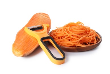 Photo of Vegetable noodles, sweet potato and peeler isolated on white