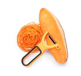 Photo of Vegetable noodles, sweet potato and peeler isolated on white, top view