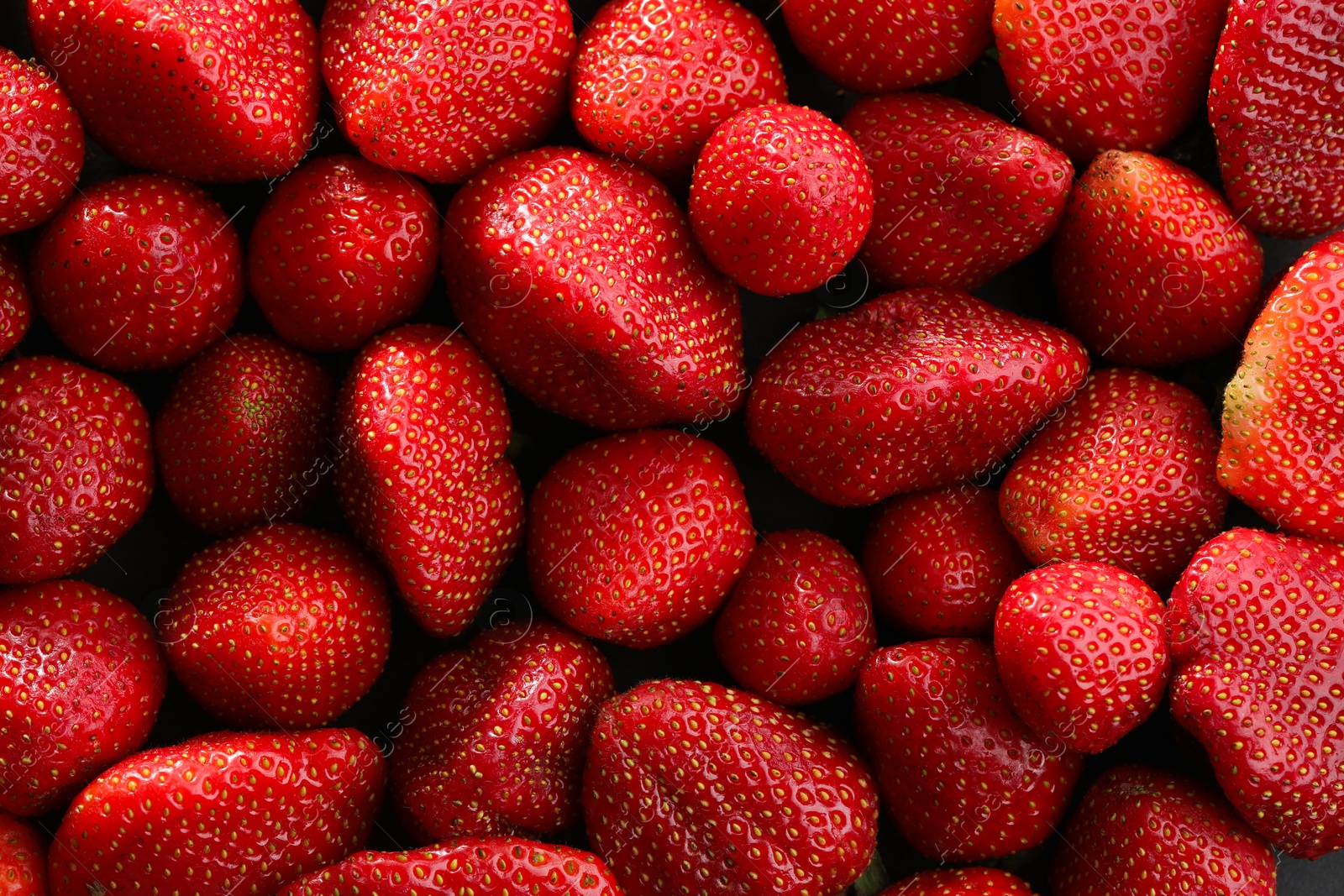 Photo of Fresh ripe strawberries as background, top view