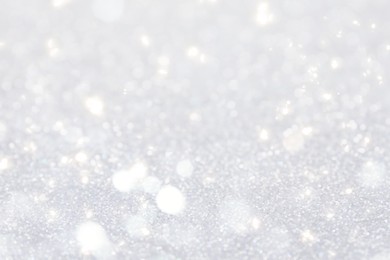 Image of Shiny silver background with sparkling glitter, bokeh effect