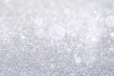 Image of Shiny silver background with sparkling glitter, bokeh effect