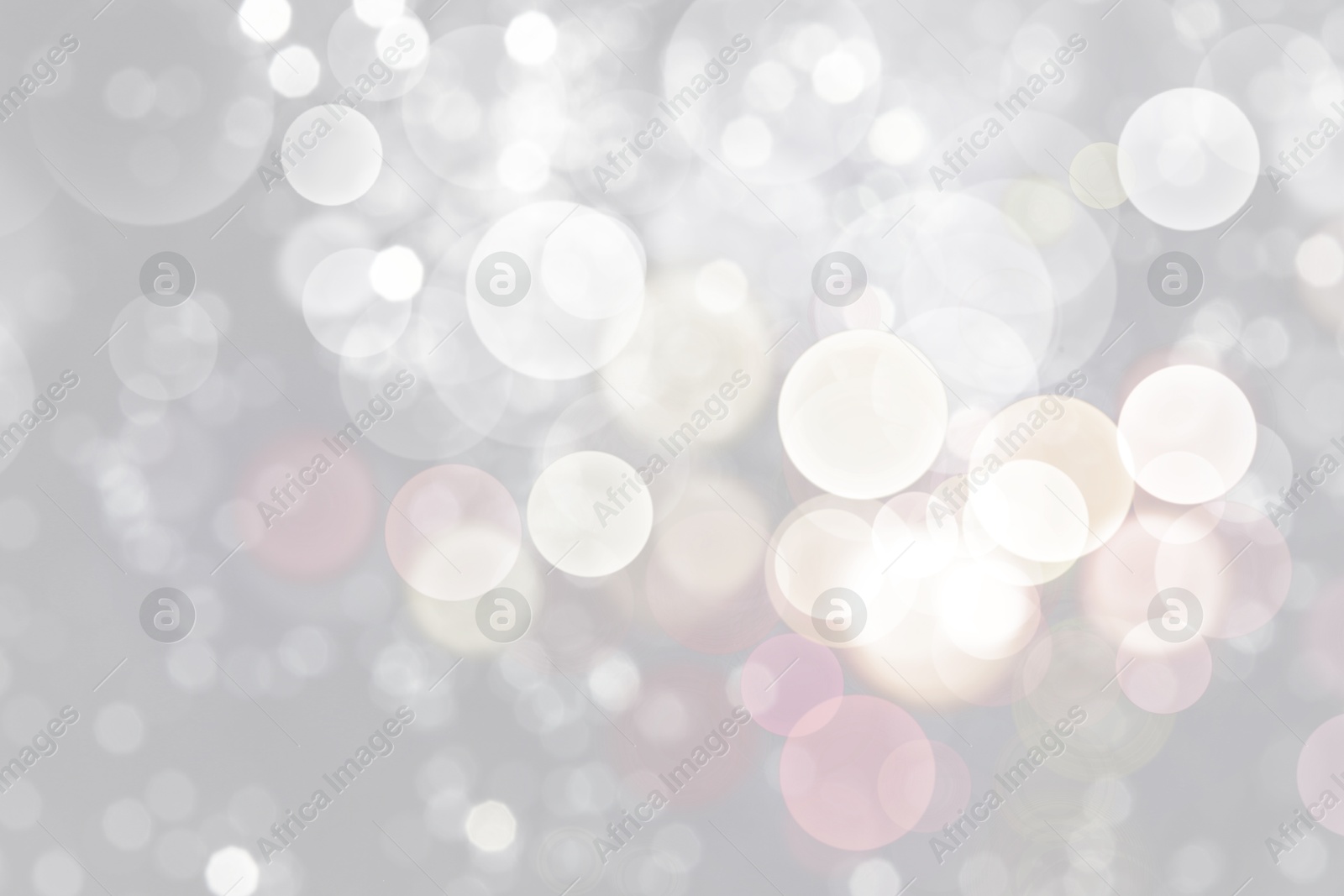 Image of Blurred shiny silver background with sparkling glitter, bokeh effect