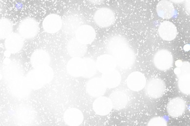 Image of Shiny silver background with sparkling glitter, bokeh effect