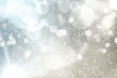 Image of Shiny silver background with sparkling glitter, bokeh effect