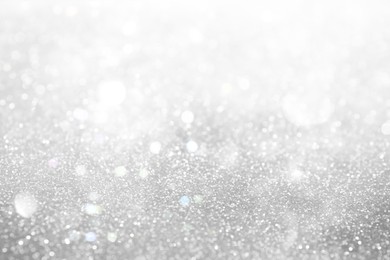 Image of Shiny silver background with sparkling glitter, bokeh effect