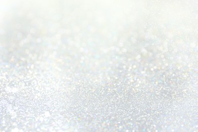 Image of Shiny silver background with sparkling glitter, bokeh effect