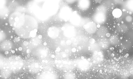 Image of Shiny silver background with sparkling glitter, bokeh effect