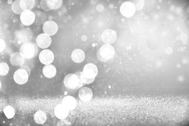Image of Shiny silver background with sparkling glitter, bokeh effect