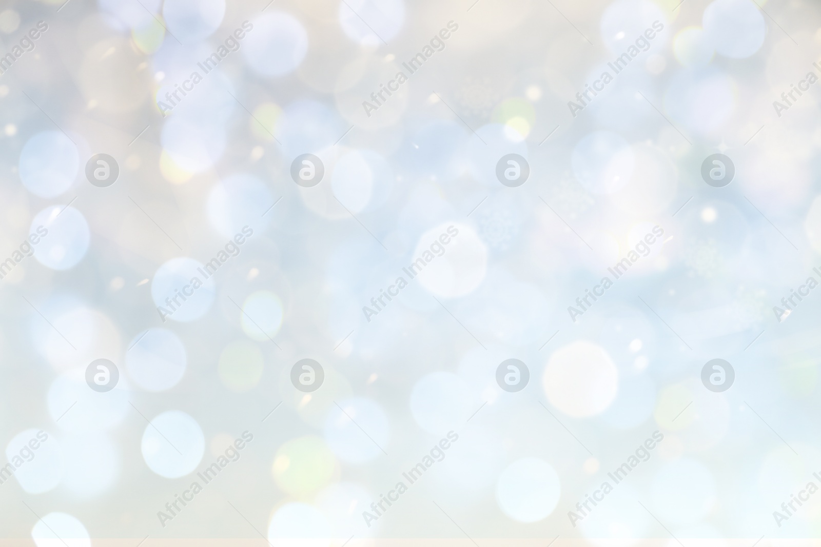 Image of Blurred shiny silver background with sparkling glitter, bokeh effect