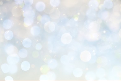 Image of Blurred shiny silver background with sparkling glitter, bokeh effect