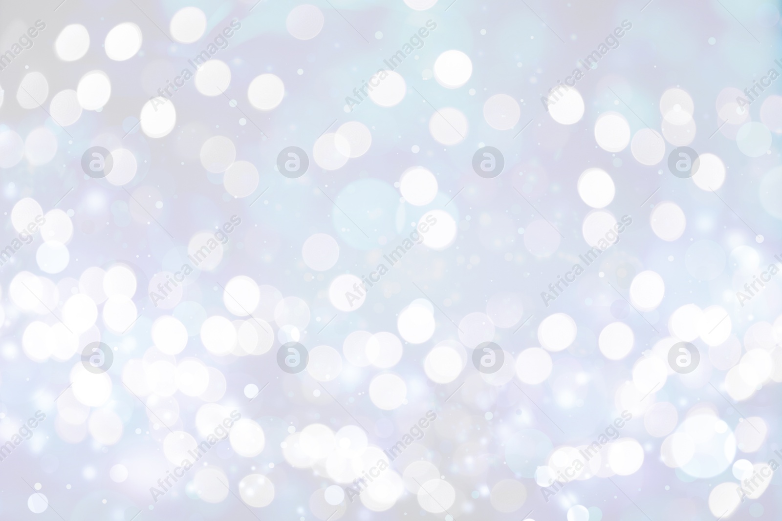 Image of Blurred shiny silver background with sparkling glitter, bokeh effect