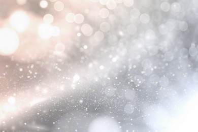 Image of Shiny silver background with sparkling glitter, bokeh effect