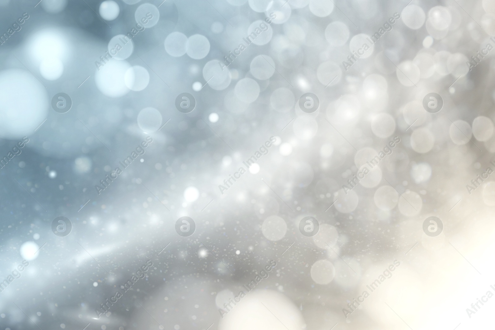 Shiny silver background with sparkling glitter, bokeh effect Image of Shiny silver background with sparkling glitter, bokeh effect