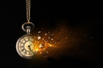 Image of Time running out. Pocket watch dissolving against black background, closeup