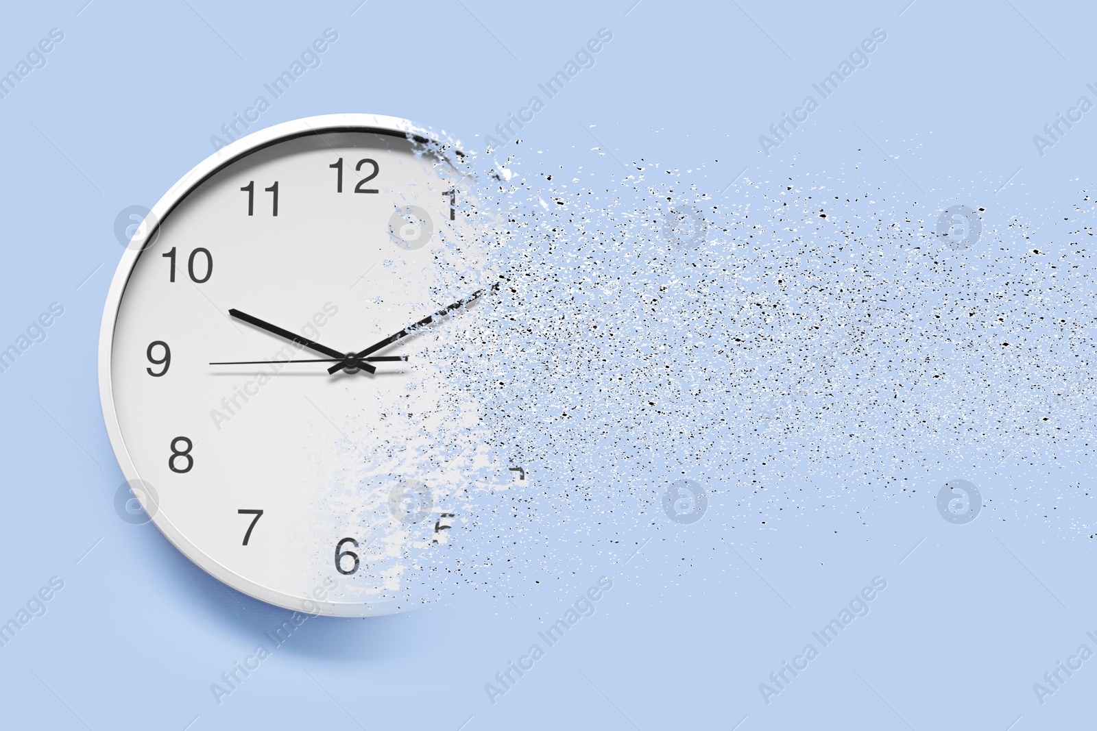Time running out. Clock dissolving on light blue background Image of Time running out. Clock dissolving on light blue background