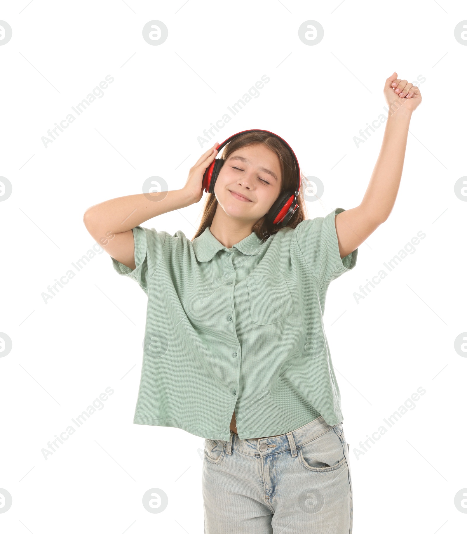 Photo of Teenage girl in headphones on white background