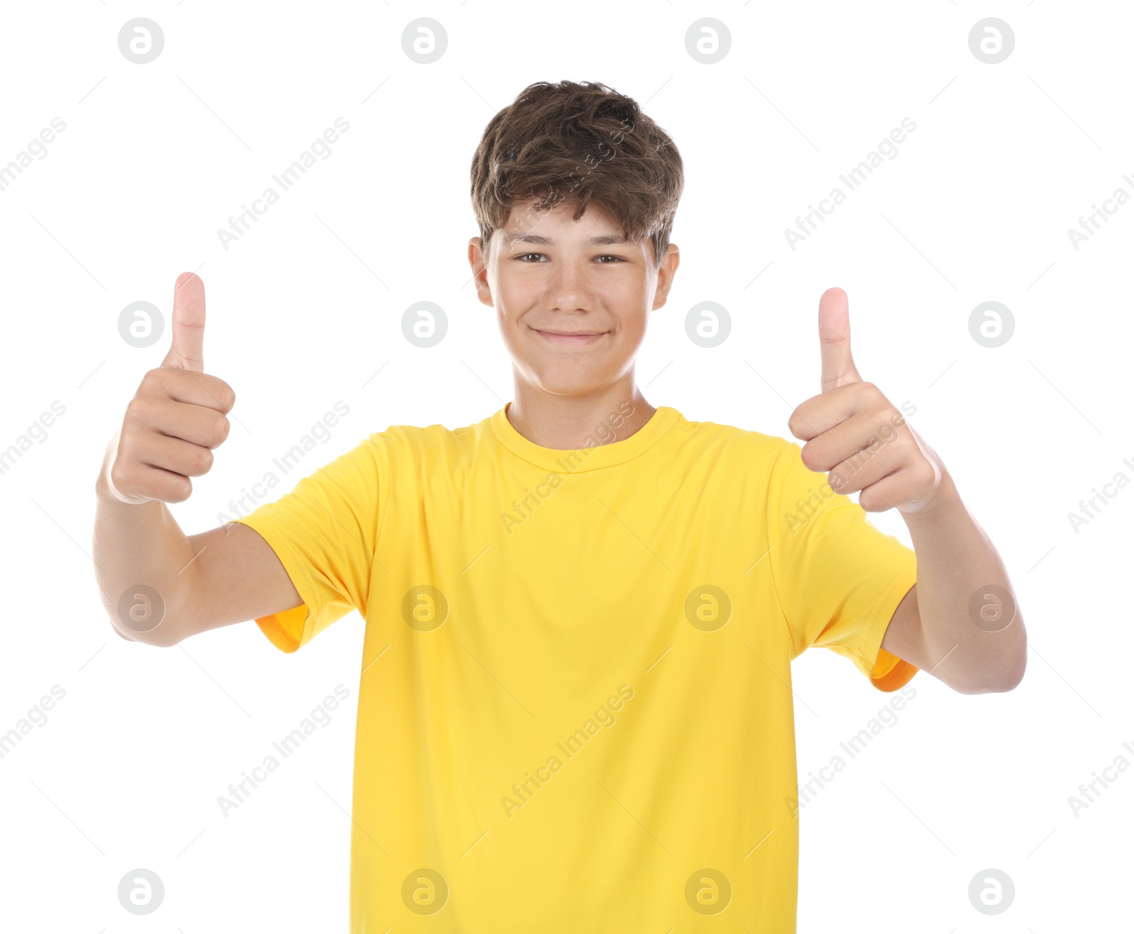 Photo of Teenage boy showing thumbs up on white background