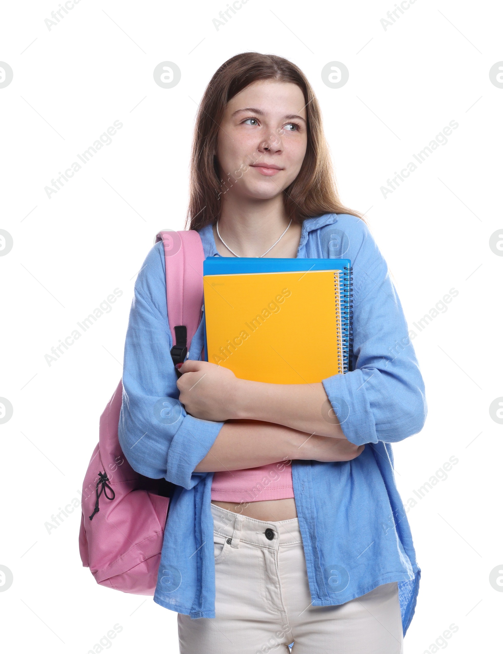 Photo of Teenage girl with backpack and notebooks on white background