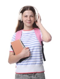 Photo of Teenage girl in headphones with backpack and notebooks on white background