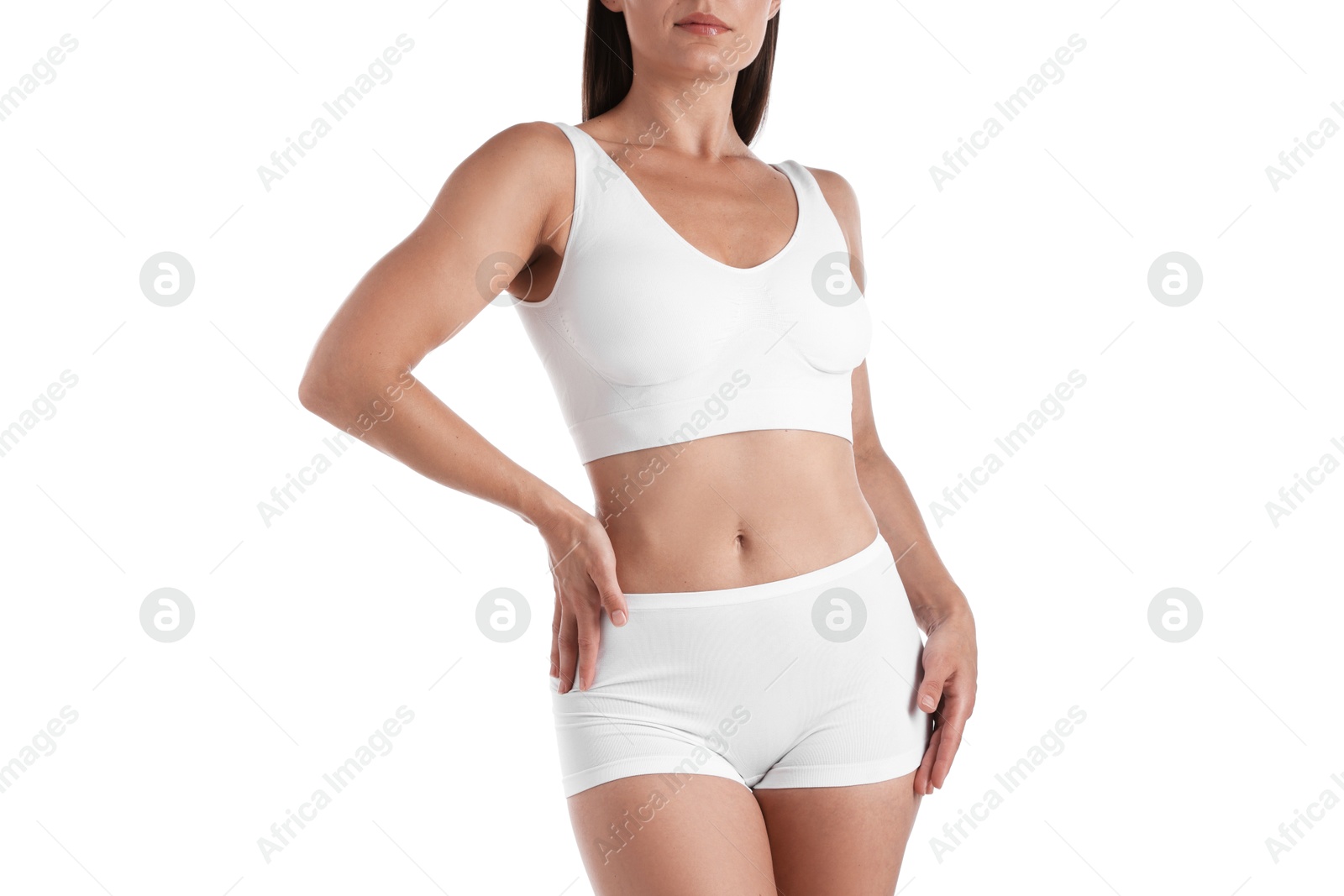 Fit woman with perfect body on white background, closeup Photo of Fit woman with perfect body on white background, closeup