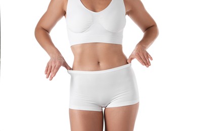 Photo of Fit woman with perfect body on white background, closeup