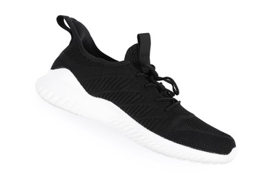 Photo of One stylish black sneaker on white background, top view