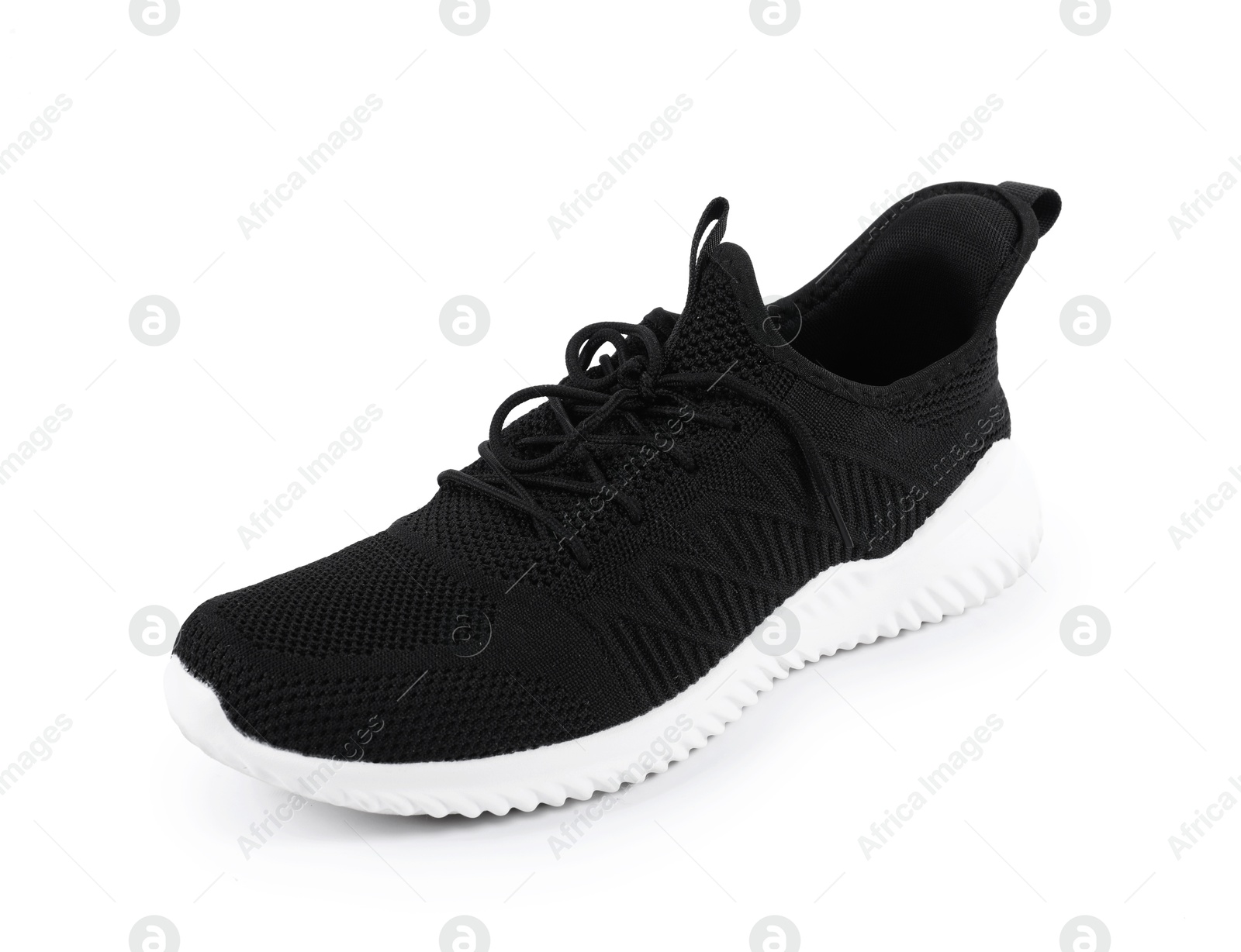 Photo of One stylish black sneaker on white background