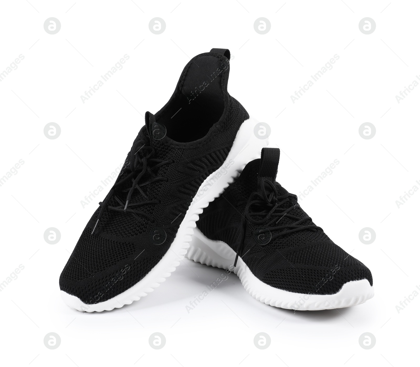 Photo of Pair of stylish black sneakers on white background