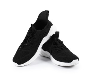 Photo of Pair of stylish black sneakers on white background
