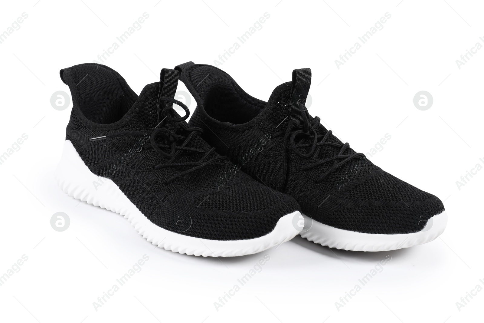 Photo of Pair of stylish black sneakers on white background