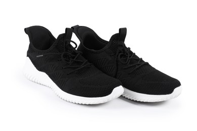 Photo of Pair of stylish black sneakers on white background