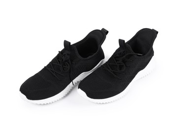 Photo of Pair of stylish black sneakers on white background