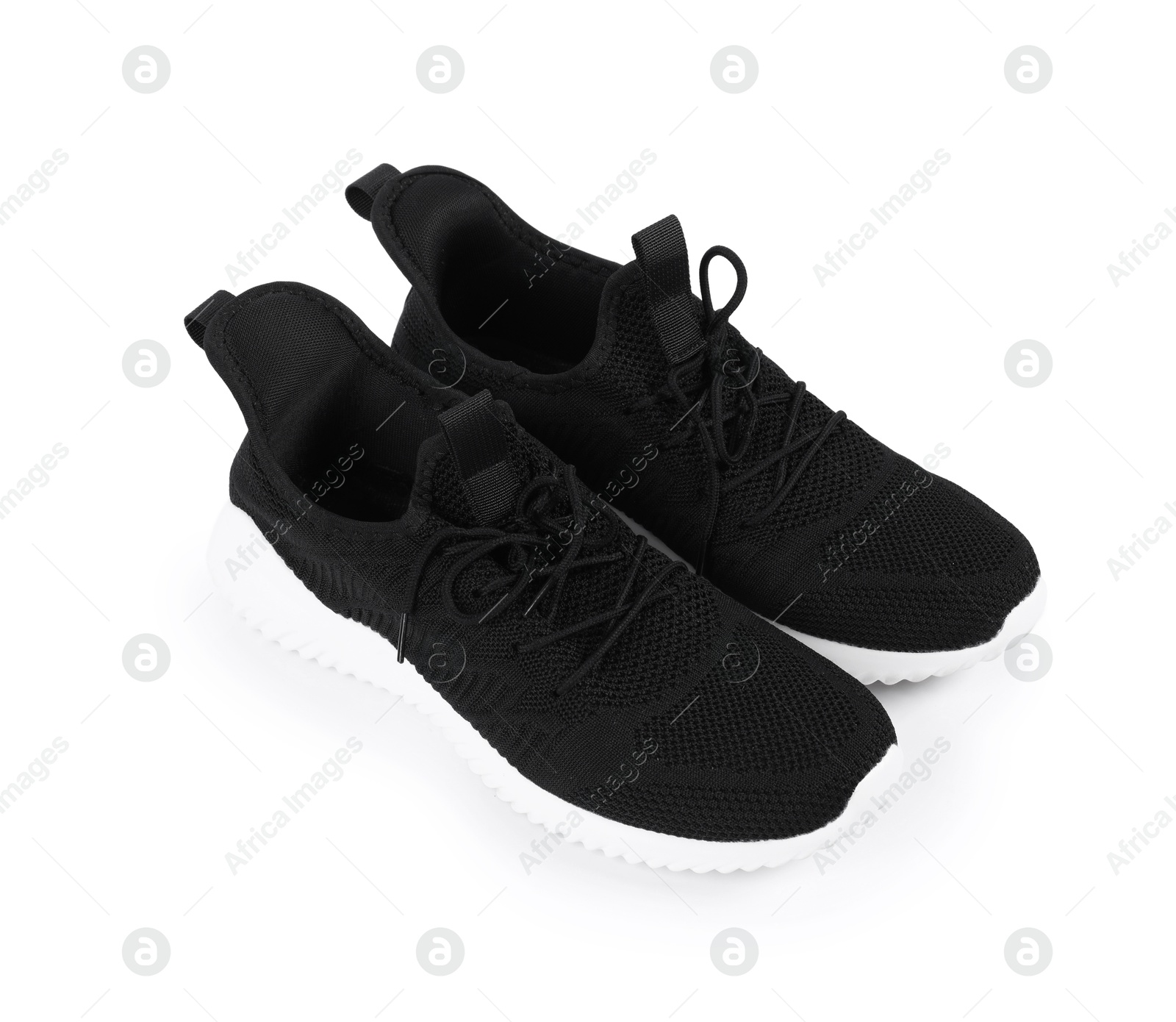 Photo of Pair of stylish black sneakers on white background