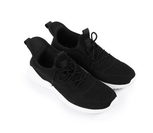Photo of Pair of stylish black sneakers on white background