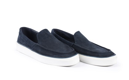 Photo of Pair of stylish dark blue shoes on white background