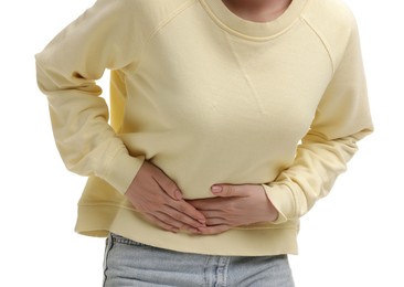 Photo of Woman suffering from abdominal pain on white background, closeup
