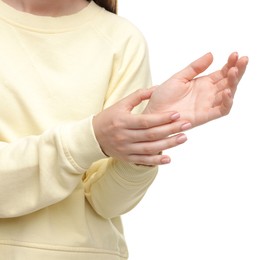 Photo of Woman suffering from wrist pain on white background, closeup