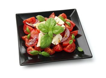 Photo of Tasty salad Caprese with mozzarella, tomatoes, basil, onion and spices isolated on white