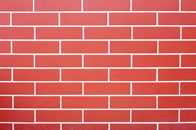 Photo of Texture of red brick wall as background, closeup