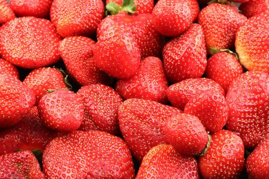 Photo of Fresh ripe strawberries as background, above view