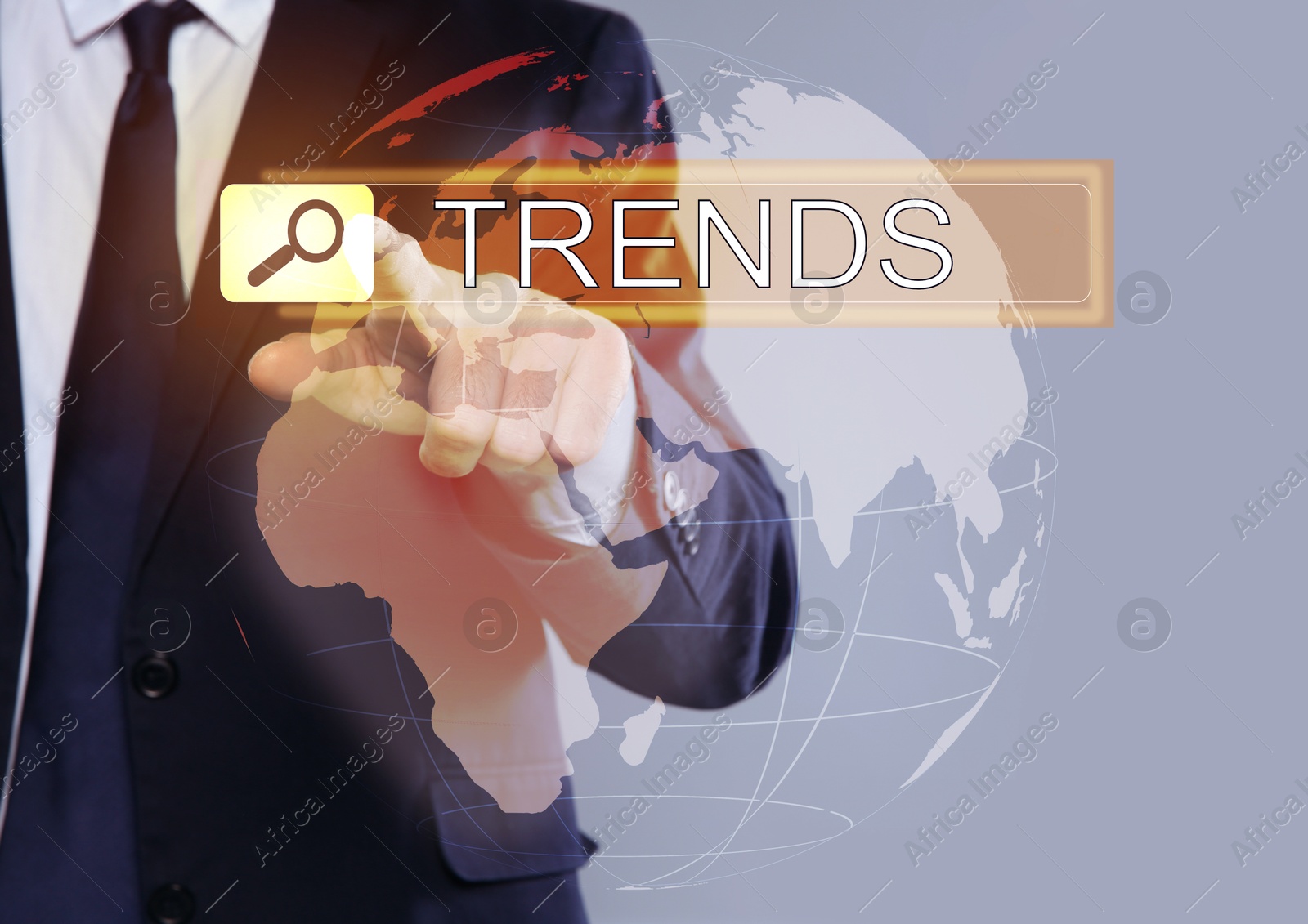 Image of Businessman using virtual screen to find hot tendencies, new ideas, popular directions against grey background, closeup. Search bar with word Trends and globe